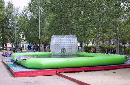 Street water zorbing attraction. Summer active entertainmentのeditorial素材