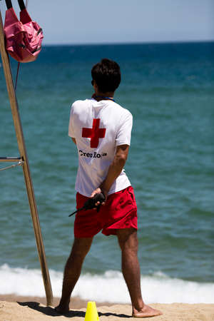 Stock Photo - Professional baywatch or life guard at the mediterranean seaのeditorial素材