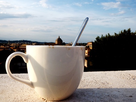 Cup of coffee on a roof of Romeの写真素材