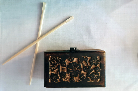 Wooden box with tallette and chopsticksの写真素材