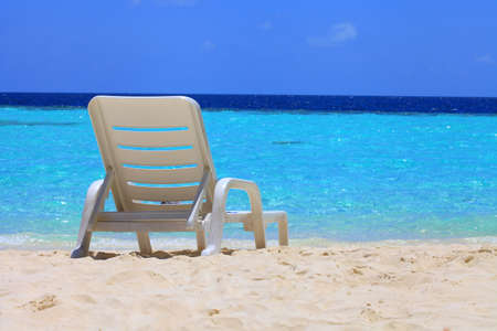 Canvas chair on the beach of tropical islandの写真素材