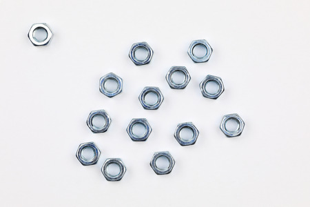 Metal screw nuts on white background