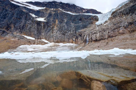 Clear lake and Angel Glacier at Mount Edith Cavell. Jasper National Park. Canadian Rockies. Alberta. Canada.の写真素材