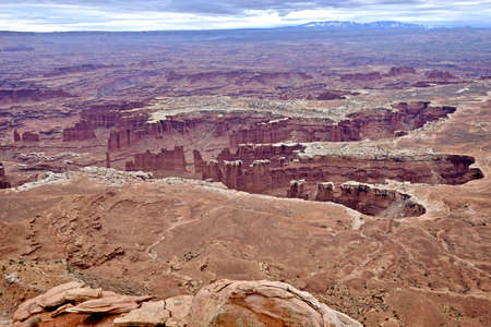 Canyon and hoodoos under storm sky. Canyonlands National Park. Moab. Utah. United States.の写真素材