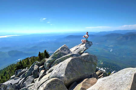 Meditation in mountains. Mount Pilchuck. Seattle. Washington. United States.のeditorial素材