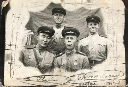 RUSSIAN FEDERATION, KIEV - July 15, 1944: Battle tank crew members before going to the historic battlle at Lwow, Ukraine. Soviet 29th Tank Brigade of the 4th Tank Army under Lt. Gen. Lelushenko.のeditorial素材