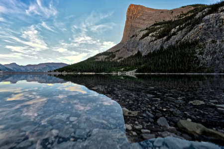 Ha LIng Peak reflection in Grassi lakes. Popular hiking trail near Canmore in Kananaskis. Canadian Rockies. Alberta. Canada.の写真素材