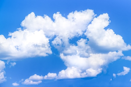 Cumulus clouds  fluffy and relief  in blue sky