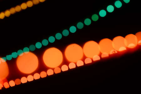 Abstract circular bokeh background of lights over dark backgroundの写真素材