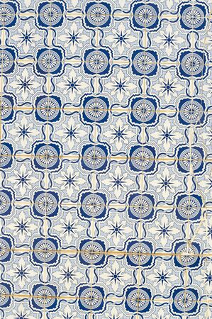 Closeup on traditional old tiles, detail of classic ceramic mosaic Portugal