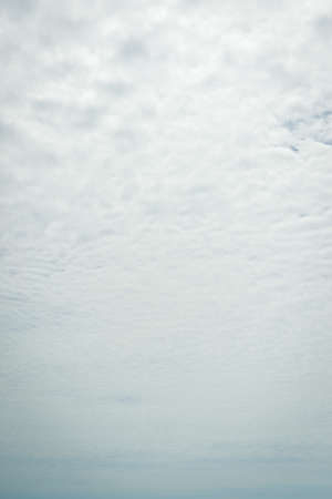 Grey stormy dark clouds nature backgroundの写真素材