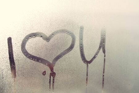 Closeup on I love you sign on glassの写真素材