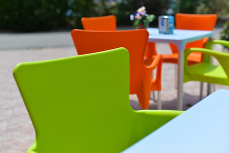 Cafe with chairs and tables, outdoors backgroundの写真素材