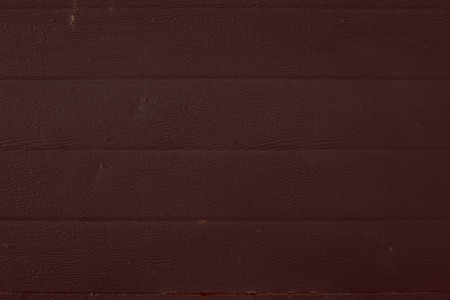 Dark burgundy metal roller door shutter texture backgroundの写真素材
