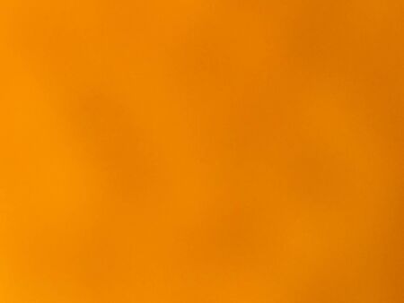 Blurry grungy abstract yellow and gold background. Blurred surfaceの写真素材