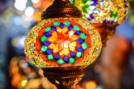 Colorful blurry shiny background of illuminated beautiful lighting lamps, closeup viewの写真素材