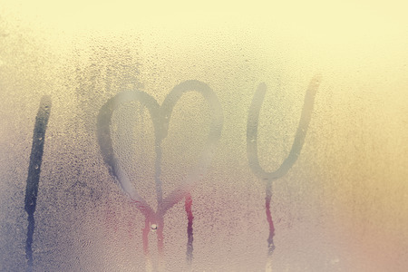 Sunny window and Love heart signの写真素材