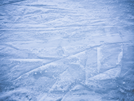 Ice skating rink scratches surface background top viewの写真素材