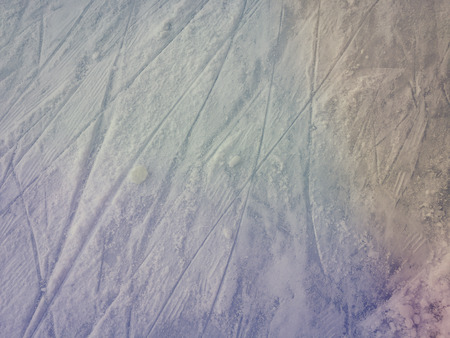 Ice scratches surface for texture or background, winter closeup top view imageの写真素材