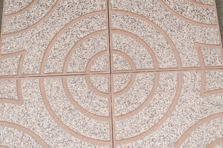 Circle design stone details of floor tiles for outdoors garden backgroundの写真素材