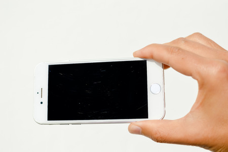 Closeup shot of young man using smartphone. Creative success busy copyspace background.