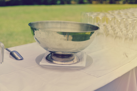 Catered service and tables ready for celebrating food eating event reception, busy light backgroundの写真素材