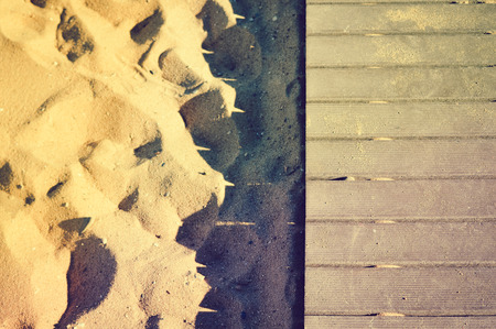 Beautiful sunny holiday travel seascape, wooden bridge on sandy beach outdoors tranquility backgroundの写真素材