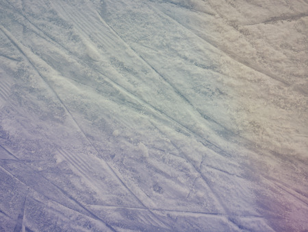 Ice scratches surface for texture or background, winter closeup top view image