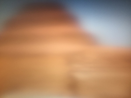 Defocused glowing light brightly abstract blurry backgroundの写真素材