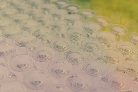 Catered service and tables ready for celebrating food eating event reception, busy light backgroundの写真素材