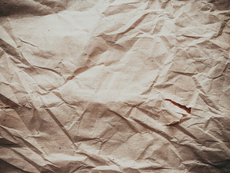 Macro closeup on textured crumpled paper backgroundの写真素材