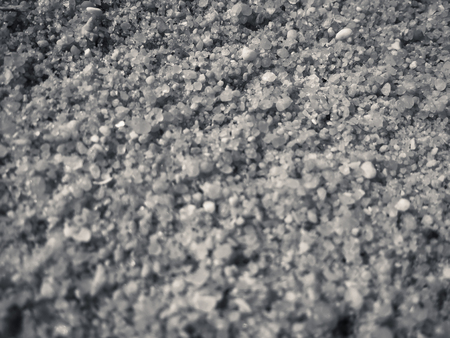 Closeup macro of natural grey sandy grained texture backgroundの写真素材