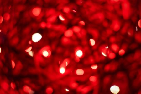 Abstract blurred bokeh urban street outdoors background, shallow depth of focus. Colorful defocused shiny night conceptの写真素材