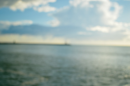 Amazing sunset beach natural blurry cloudy sky outdoors backgroundの写真素材