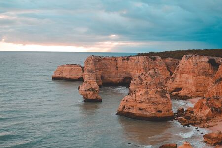 Beautiful cliffs and sea coastline outdoors natural background Portugal Europe. Recreational tourism inspirational scenery photographの写真素材