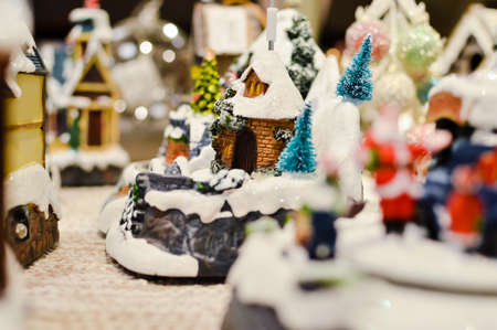 Decorated Christmas children shopping toys on joyful festive shiny blurred light background, closeup image. Seasonal elegant natural classy mood, love peace jolly decor design, traditional bright joyの写真素材