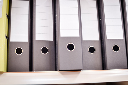 Close up on many record files folder case, stationery office copyspace background. Group...