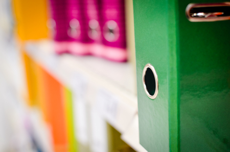 Close up on many record files folder case, stationery office copyspace background. Group organization financial data, colorful copy space concept paperworkの写真素材