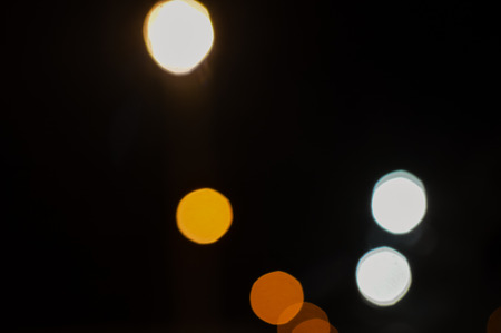 Blurry abstract light night city bokeh backgroundの写真素材