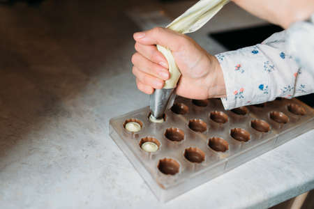 Process of making sweet chocolate sweets homemade.の写真素材