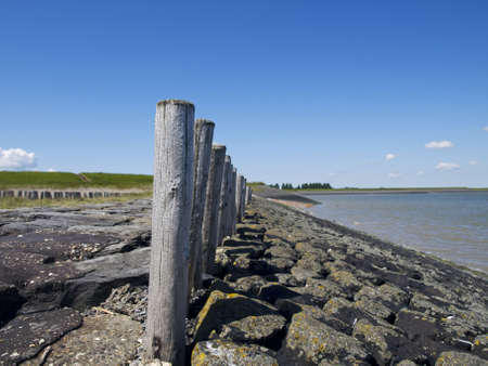 A shore or coast were the land meets the seaの写真素材