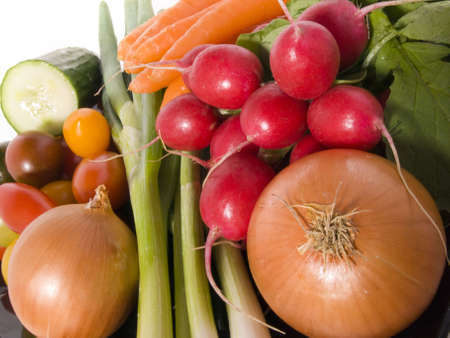 Different kind of fresh vegetables are isolatedの写真素材