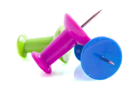 Pushpins in different colors isolated on a white backgroundの写真素材