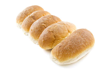 Fresh bread in a row isolated over whiteの写真素材