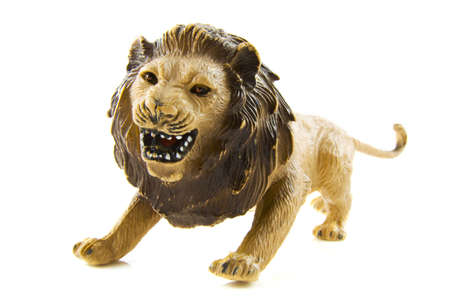 A lion toy isolated on a white backgroundの写真素材