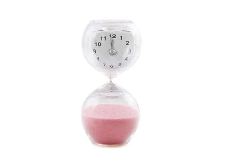 Sand glass with clock in upper glass isolated over white