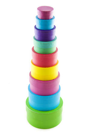 Different kind of colorful gift boxes on a pile isolated over whiteの写真素材