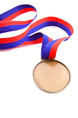 Medal with red and blue isolated over whiteの写真素材