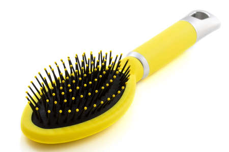 Yellow brush isolated on a white backgroundの写真素材
