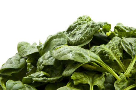 Fresh delicious spinach on a white background